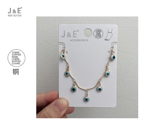 Tobillera dorada ojos azules